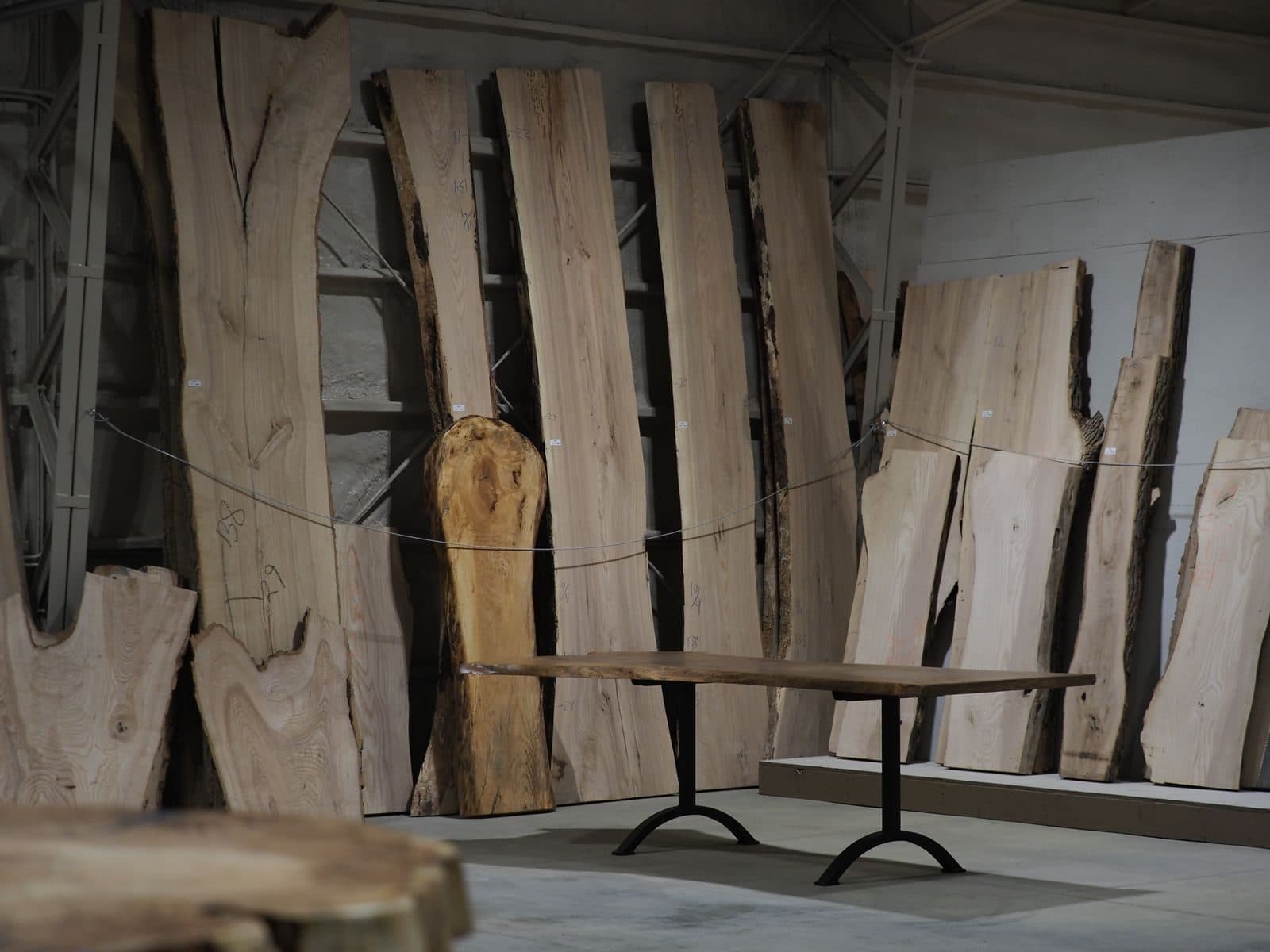 Slabs stacked wide across the APOC workshop